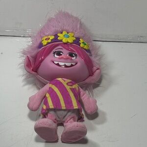 Dreamworks Pink and Yellow Battery Operated Troll Doll with Flower Headband